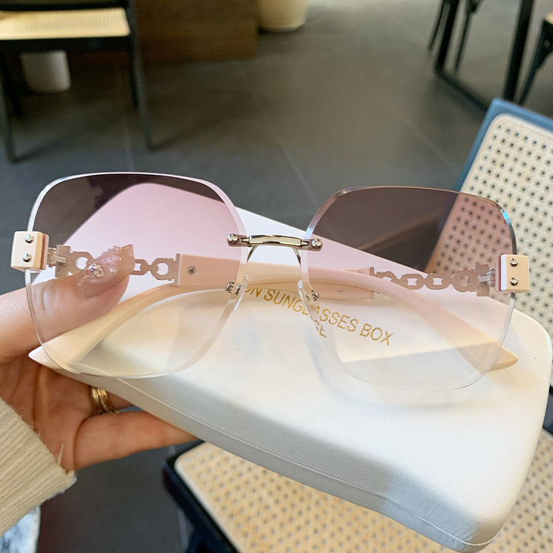 New fashion sunglasses chain glasses legs large frame retro sunglasses frameless trimmed high-end chain glasses